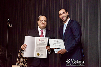 Seen here, President of JLA, Gene Rosen, presents the scholarship award to Touro Law student Sina Nazmiyal at JLA's annual Installation Dinner. 
Photo by J.S. Visions Photography