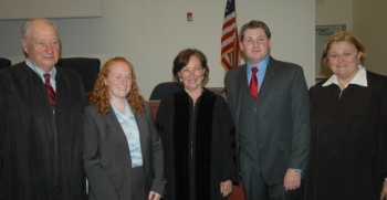 The finalists are shown with the finals bench: Justice Rosalie Silberman Abella, Supreme Court of Canada, center, presiding; and US District Court Judges Leonard Wexler, EDNY, left, and the Honorable Janet Hall, District of Connecticut, right.