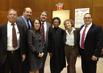 Shown left to right are coach Adjunct Professor Steven Kunken, Seth Koslow, Stefanie Guarino, Avi Goldstein, State Supreme Court Justice Bernadette Bayne, coach Professor Lynne Kramer and Jared Scotto.