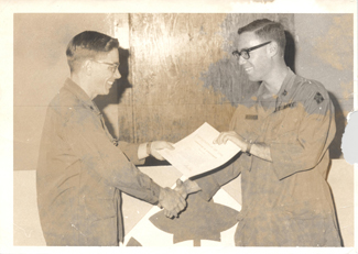 Ken Rosenblum (right) receives the bronze star.