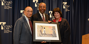 Touro Law Dean Emeritus Howard Glickstein, Frederick K. Brewington, Esq. and Dean Patricia Salkin.