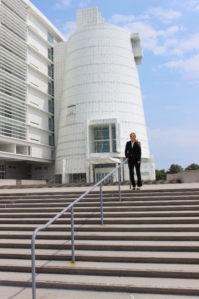 Picture of Emma Henry in fron of court house